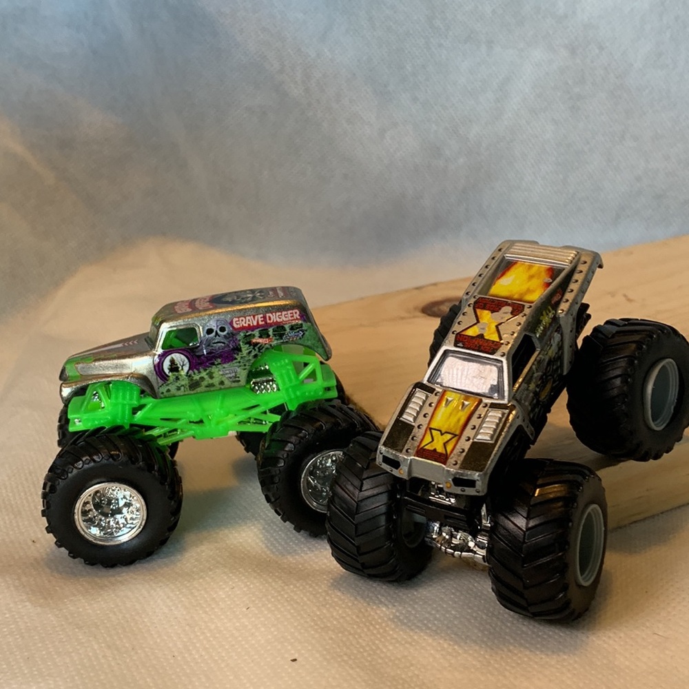 Lot of 2 Hotwheels Monster Trucks Grave Digger And Monster Jam